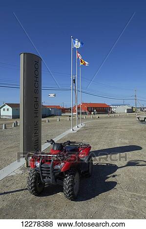 ATV parked outside Kiilinik High School; Cambridge Bay, Victoria Island, Nunavut, Canada View Large Photo Image Stock Photo - ATV parked outside Kiilinik High School; Cambridge Bay, Victoria Island, Nunavut, Canada. Fotosearch