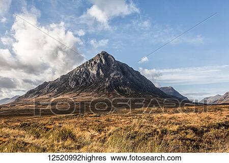 Stock Photograph - Autumn view of Etive Mor in Scotland with bright blue and white sky; Scotland. Fotosearch