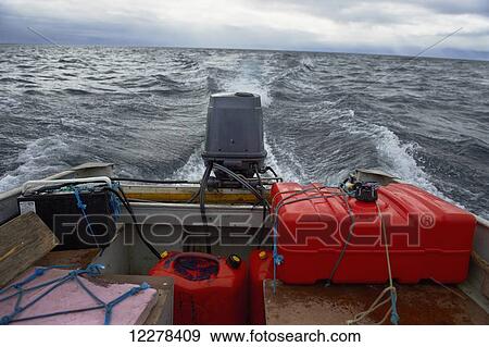 Stock Photo - Back of power boat, Arctic Ocean, North of Arctic Circle; Nunavut, Canada. Fotosearch