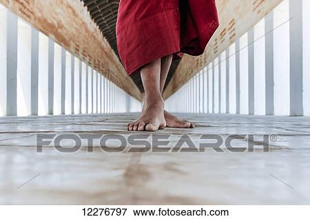 Bare feet of a buddhist monk in the corridor of the temple; Bagan, Myanmar View Large Photo Image Stock Photo - Bare feet of a buddhist monk in the corridor of the temple; Bagan, Myanmar. Fotosearch