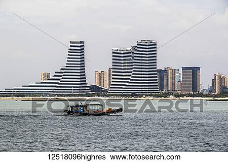 Stock Photograph - Barge in Lujiang Strait; Xiamen, Fujian, China. Fotosearch