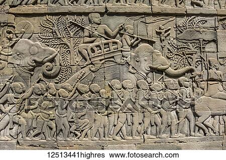 Bas-relief battle scene between the Khmer and Cham armies with Elephants on the Eastern gallery of the Bayon; Angkor Thom, Siem Reap, Cambodia View Large Photo Image Stock Photograph - Bas-relief battle scene between the Khmer and Cham armies with Elephants on the Eastern gallery of the Bayon; Angkor Thom, Siem Reap, Cambodia. Fotosearch