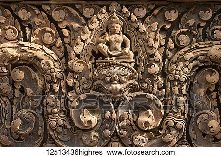 Stock Photograph - Bas-relief of Shiva mounted on Kala in Banteay Srei; Angkor, Siem Reap, Cambodia. Fotosearch