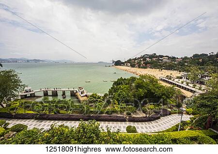 Stock Photograph - Beach along Kulangsu, a historic international settlement; Xiamen, Fujian, China. Fotosearch