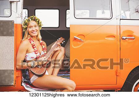 Beach Lifestyle, Beautiful Surfer Girl With Ukulele And Classic Vintage Surf Van On The Beach At Sunset View Large Photo Image Stock Photograph - Beach Lifestyle, Beautiful Surfer Girl With Ukulele And Classic Vintage Surf Van On The Beach At Sunset. Fotosearch