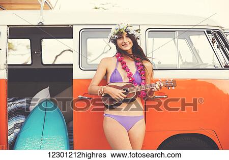 Beach Lifestyle, Beautiful Surfer Girl With Ukulele And Classic Vintage Surf Van On The Beach At Sunset View Large Photo Image Stock Photograph - Beach Lifestyle, Beautiful Surfer Girl With Ukulele And Classic Vintage Surf Van On The Beach At Sunset. Fotosearch