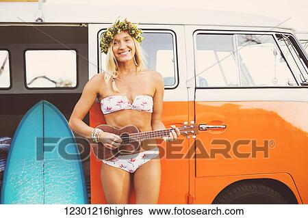 Beach Lifestyle, Beautiful Surfer Girl With Ukulele And Classic Vintage Surf Van On The Beach At Sunset View Large Photo Image Stock Photograph - Beach Lifestyle, Beautiful Surfer Girl With Ukulele And Classic Vintage Surf Van On The Beach At Sunset. Fotosearch
