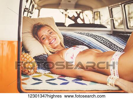 Beach Lifestyle, Beautiful Surfer Girl Relaxing In Classic Vintage Surf Van On The Beach At Sunset View Large Photo Image Stock Photograph - Beach Lifestyle, Beautiful Surfer Girl Relaxing In Classic Vintage Surf Van On The Beach At Sunset. Fotosearch