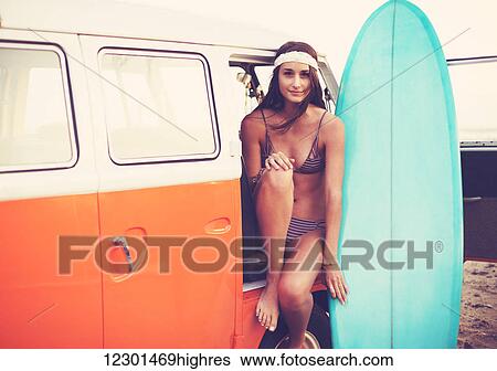 Beach Lifestyle, Beautiful Surfer Girl With Classic Vintage Surf Van On The Beach At Sunset View Large Photo Image Stock Photograph - Beach Lifestyle, Beautiful Surfer Girl With Classic Vintage Surf Van On The Beach At Sunset. Fotosearch