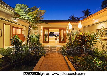 Stock Photograph - Beautiful Garden Entrance To Luxury Home. Fotosearch