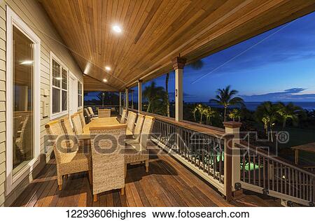 Beautiful Home Exterior Patio Deck And Dining Table With Sunset View View Large Photo Image Stock Photograph - Beautiful Home Exterior Patio Deck And Dining Table With Sunset View. Fotosearch