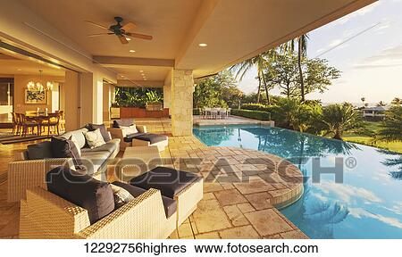 Beautiful Luxury Home With Swimming Pool At Sunset View Large Photo Image Stock Photograph - Beautiful Luxury Home With Swimming Pool At Sunset. Fotosearch