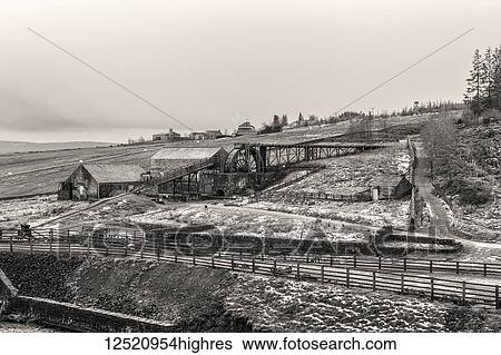Stock Photograph - Black and white image of Killhope Mine in winter; England. Fotosearch