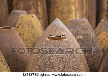 Bomb casings dating to the Indochina Wars; Phonsavan, Xiangkhouang, Laos View Large Photo Image Stock Photograph - Bomb casings dating to the Indochina Wars; Phonsavan, Xiangkhouang, Laos. Fotosearch