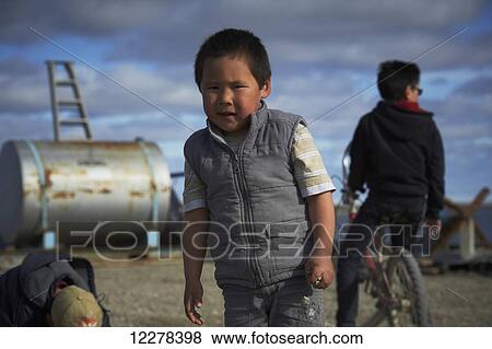 Boys playing; Cambridge Bay, Nunavut, Canada View Large Photo Image Stock Photo - Boys playing; Cambridge Bay, Nunavut, Canada. Fotosearch