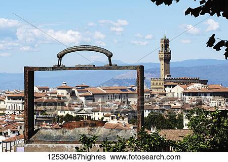 Bronze suitcase, Partir by Jean Michel Foron in the Giardino delle Rose, with the Palazzo Vecchio in the background, below the Piazzale Michelangelo; Florence, Tuscany, Italy View Large Photo Image Stock Photograph - Bronze suitcase, Partir by Jean Michel Foron in the Giardino delle Rose, with the Palazzo Vecchio in the background, below the Piazzale Michelangelo; Florence, Tuscany, Italy. Fotosearch
