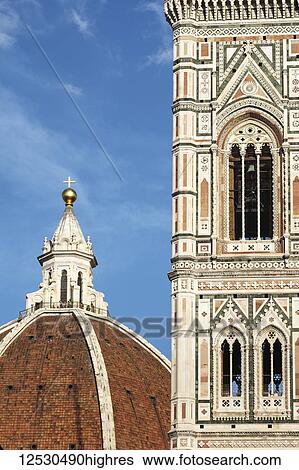 Stock Photograph - Brunelleschi's Dome and Giotto's Campanile in the Piazza del Duomo; Florence, Tuscany, Italy. Fotosearch