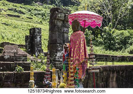 Stock Photograph - Buddha statue at the Vat Phou Temple Complex; Champasak, Laos. Fotosearch