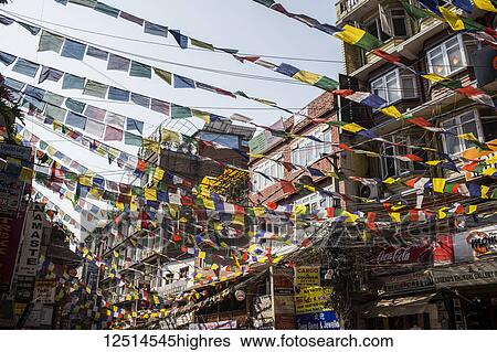 Stock Photograph - Buddhist prayer flags in the city of Kathmandu; Kathmandu, Nepal. Fotosearch