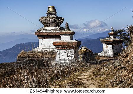 Stock Photograph - Buddhist stupa with earthquake damage in the Himalayas; Nepal. Fotosearch