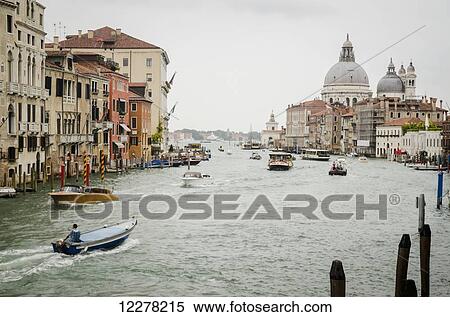 Busy water motorway of the Grand Canal and view of the Salute; Venice, Italy View Large Photo Image Stock Photography - Busy water motorway of the Grand Canal and view of the Salute; Venice, Italy. Fotosearch