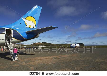 Canadian North Plane, passengers loading; Kuglatuk, Nunavut, Canada View Large Photo Image Stock Photograph - Canadian North Plane, passengers loading; Kuglatuk, Nunavut, Canada. Fotosearch