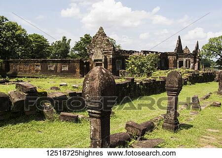 Stock Photograph - Causeway bordered by sandstone posts, Vat Phou Temple Complex; Champasak, Laos. Fotosearch