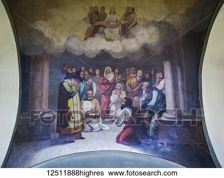 Stock Photograph - Christian Faith artwork depicting figures standing, kneeling and looking up to a cloud with Jesus and His followers with a cross; Belgrade, Vojvodina, Serbia. Fotosearch