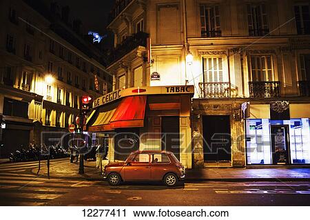 City street with a red hatch back car; Paris, France View Large Photo Image Stock Image - City street with a red hatch back car; Paris, France. Fotosearch
