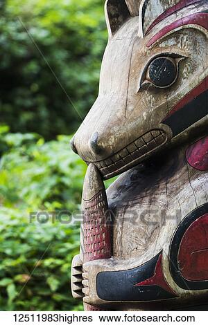 Close-up of a painted wooden indigenous sculpture of animal representation; Tofino, British Columbia, Canada View Large Photo Image Stock Photograph - Close-up of a painted wooden indigenous sculpture of animal representation; Tofino, British Columbia, Canada. Fotosearch