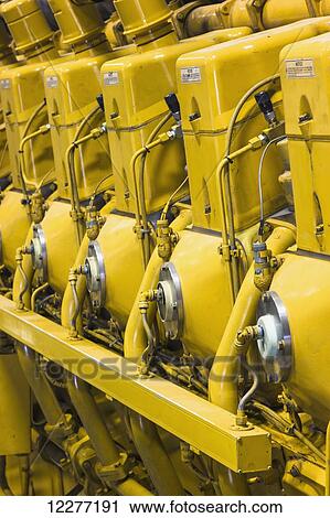 Close up of a yellow diesel generator inside an electrical power plant, Prudhoe Bay, Arctic Alaska, USA, Summer View Large Photo Image Stock Image - Close up of a yellow diesel generator inside an electrical power plant, Prudhoe Bay, Arctic Alaska, USA, Summer. Fotosearch