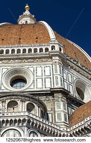 Close-up of Brunelleschi's Dome of Florence Cathedral decorative details of facade and blue sky; Florence, Tuscany, Italy View Large Photo Image Stock Photograph - Close-up of Brunelleschi's Dome of Florence Cathedral decorative details of facade and blue sky; Florence, Tuscany, Italy. Fotosearch