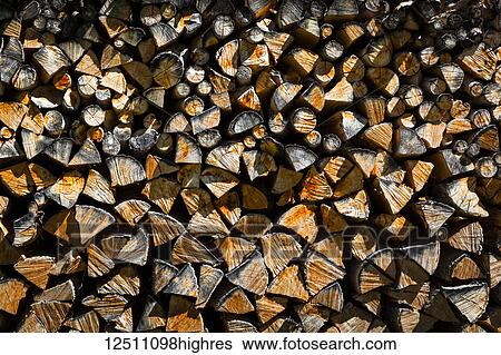 Stock Photograph - Close-up of stacked firewood at village of Praz de Fort; Praz de Fort, Val Ferret, Switzerland. Fotosearch