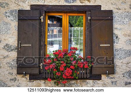 Close-up of Swiss chalet window with flower pot; La Fouly, Val Ferret, Switzerland View Large Photo Image Stock Photograph - Close-up of Swiss chalet window with flower pot; La Fouly, Val Ferret, Switzerland. Fotosearch