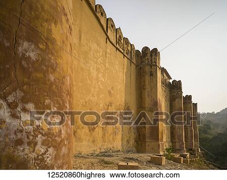 Stock Photograph - Close-up of the weathered wall of Amer Fort; Jaipur, Rajasthan, India. Fotosearch