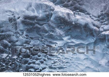 Stock Photograph - Close-up view of the ice from an iceberg, Jokulsarlon, South coast; Iceland. Fotosearch