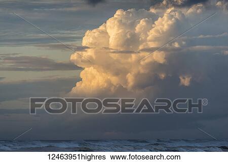 Clouds build up along the Oregon Coast over the horizon; Seaside, Oregon, United States of America View Large Photo Image Stock Photograph - Clouds build up along the Oregon Coast over the horizon; Seaside, Oregon, United States of America. Fotosearch