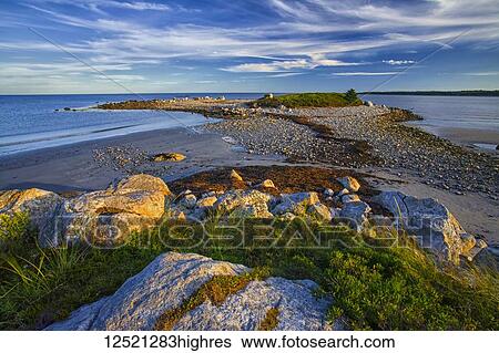 Coastal headland at Sandy Bay Beach, which borders Thomas Raddall Provincial Park; Nova Scotia, Canada View Large Photo Image Stock Photograph - Coastal headland at Sandy Bay Beach, which borders Thomas Raddall Provincial Park; Nova Scotia, Canada. Fotosearch