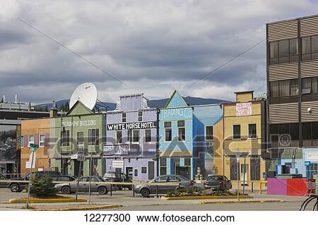 Stock Image - Colorful buildings and shops on Main Street in downtown Whitehorse, Yukon, Canada, Summer, Panorama. Fotosearch