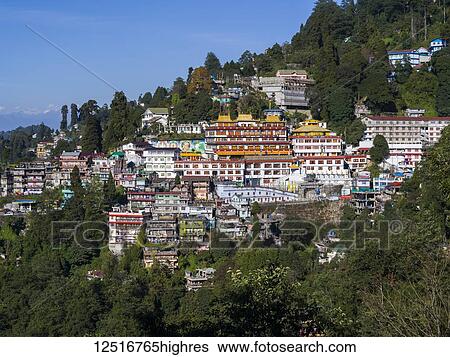 Stock Photograph - Colourful buildings in the town of Darjeeling on a mountainside; Darjeeling, West Bengal, India. Fotosearch