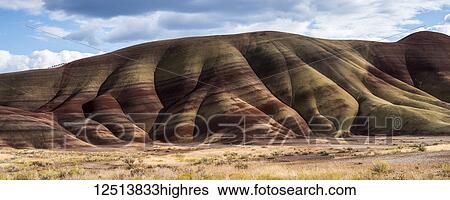 Stock Photograph - Colourful layers of minerals are exposed at John Day Fossil Beds National Monument; Mitchell, Oregon, United States of America. Fotosearch