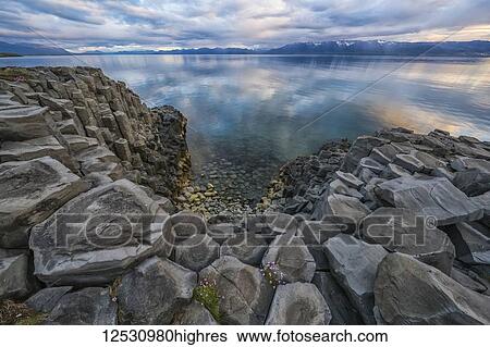 Stock Photograph - Columnar basalt near the town of Hofsos; Iceland. Fotosearch