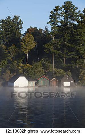 Cottage boathouses on Lake Rosseau in Ontario's Muskoka region; Rosseau, Ontario, Canada View Large Photo Image Stock Photograph - Cottage boathouses on Lake Rosseau in Ontario's Muskoka region; Rosseau, Ontario, Canada. Fotosearch