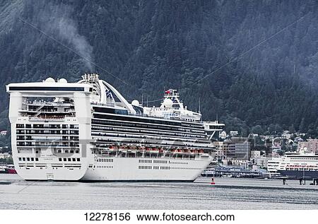 Cruise ship Star Princess maneuvers in Gastineau Channel to anchor at Juneau, Southeast Alaska, summer View Large Photo Image Stock Photograph - Cruise ship Star Princess maneuvers in Gastineau Channel to anchor at Juneau, Southeast Alaska, summer. Fotosearch