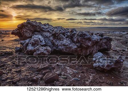 Crumbling iceberg on the shore, Burntcoat Head, Minas Basin; Nova Scotia, Canada View Large Photo Image Stock Photograph - Crumbling iceberg on the shore, Burntcoat Head, Minas Basin; Nova Scotia, Canada. Fotosearch