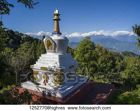 Decorative Buddhist monument on a mountainside with a view of the Himalayas; Kaluk, Sikkim, India View Large Photo Image Stock Photograph - Decorative Buddhist monument on a mountainside with a view of the Himalayas; Kaluk, Sikkim, India. Fotosearch