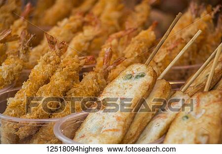 Deep-fried seafood for sale on Kulangsu Island; Xiamen, Fujian, China View Large Photo Image Stock Photograph - Deep-fried seafood for sale on Kulangsu Island; Xiamen, Fujian, China. Fotosearch