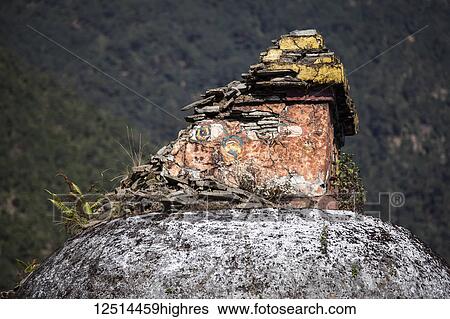 Stock Photograph - Earthquake damaged stupa in the Nepalese Himalayas; Nepal. Fotosearch