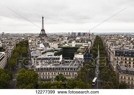 Eiffel tower and streets during the daytime; Paris, France View Large Photo Image Stock Photo - Eiffel tower and streets during the daytime; Paris, France. Fotosearch