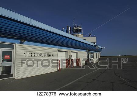 Exterior of arrivals area of Yellowknife Airport; Yellowknife, Northwest Territories, Canada View Large Photo Image Stock Photograph - Exterior of arrivals area of Yellowknife Airport; Yellowknife, Northwest Territories, Canada. Fotosearch
